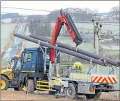  ?? ?? Engineers repair power lines near Strichen