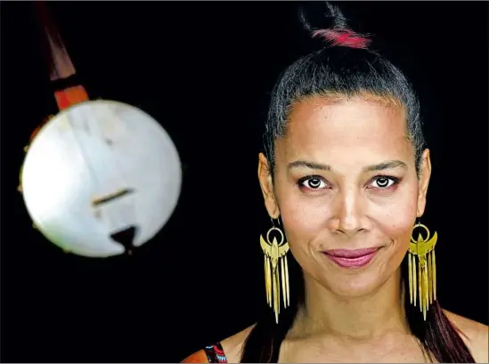  ?? Rick Loomis For The Times ?? “I’M NOT TRYING to strip anybody’s accomplish­ments from anyone,” says singer Rhiannon Giddens. “I’m just asking, ‘Can we look at this a little more accurately?’ ”