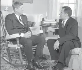  ??  ?? The Associated Press President John F. Kennedy sits in his rocker — which sold at a Friday auction — in the White House in 1961 as he talks with Soviet Foreign Minister Andrei Gromyko.