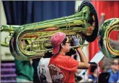  ?? / Rome City Schools ?? David Luna practices on the tuba as part of Rome High’s Sound of the Seven Hills band practice.