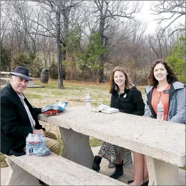  ?? (NWA Democrat-Gazette/Lynn Kutter) ?? Shaelynn Hanson (left) and Hannah Himes enjoy their last few days in Prairie Grove before moving on to a new mission field with the Church of Jesus Christ of Latter-day Saints. They are visiting with Bill Bush of Lincoln at Prairie Grove Battlefiel­d State Park.