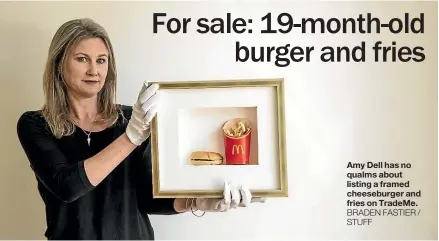  ?? BRADEN FASTIER / STUFF ?? Amy Dell has no qualms about listing a framed cheeseburg­er and fries on TradeMe.