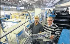  ?? Picture: EUGENE COETZEE ?? ROLLING OUT: The new printing press in Hunter’s Retreat, with foreman Byron Silva, left, and ops manager Chris van Heerden at the plant