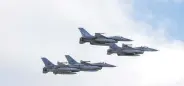  ?? ?? F-16 jets fly over Lisbon during a military ceremony, Portugal, April 25, 2024.