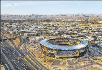  ?? L.E. Baskow Las Vegas Review-Journal @Left_Eye_Images ?? Clark County officials want to devise land use plans for the area around Allegiant Stadium, the future home of the Raiders and the UNLV football team.