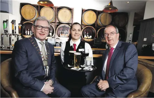  ??  ?? Pictured at the 44th AGM of the Vintners’ Federation of Ireland (VFI) are VFI president Pat Crotty (left) and VFI chief executive Padraig Cribben with Lizzy Costa from the Radisson Blu Hotel in Athlone, Co Westmeath