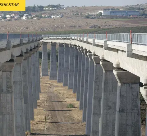  ?? SEBASTIAN SCHEINER / THE ASSOCIATED PRESS FILES ?? A bridge under constructi­on near Latrun, Israel, is part of the high-speed rail link between Tel Aviv and Jerusalem. Israel’s transporta­tion minister is pushing ahead with a plan to extend the line to the Western Wall, where he wants to name a future station after U.S. President Donald Trump.