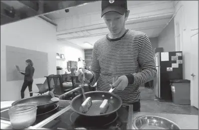  ?? AP/JEFF CHIU ?? Hampton Creek Foods pastry chef Ben Roche prepares french toast made with Just Scramble at the company’s office in San Francisco.