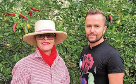 ??  ?? SPICE OF LIFE: Lynne Seaton-Anderson and son Jason O'Connor get set for this weekend's Murphys Creek Chilli Festival.