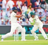  ?? AP ?? India’s Virat Kohli plays a shot on day three of the first cricket Test against Australia in Adelaide, yesterday.