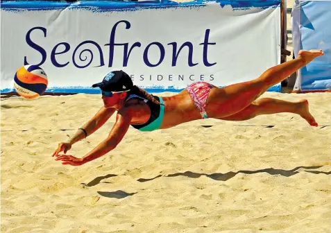  ??  ?? Bea Tan of Perlas Uno dives for the ball during their match against UNO-R1 in the Beach Volley Republic (BVR) on Tour Season 3-Cebu leg at the Beach Placid Resort sandcourt in Sta. Fe, Bantayan Island.