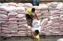  ??  ?? NATIONAL FOOD AUTHORITY rice at a warehouse in Quezon City.