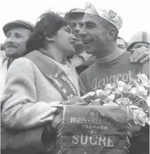  ??  ?? To the victor the spoils. Pino Cerami gets the girl at Roubaix