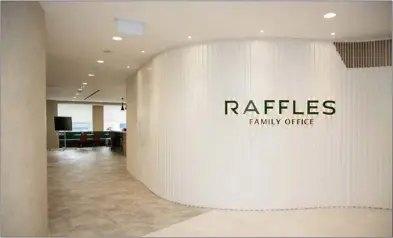  ?? PROVIDED TO CHINA DAILY ?? An office owned by Raffles Family Office, a wealth manager.