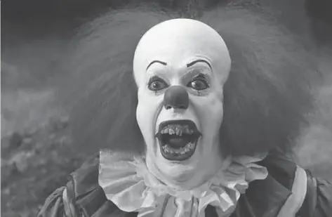  ??  ?? Tim Curry terrified audiences with his portrayal of Pennywise in the 1990 television version of Stephen King’s novel It.