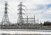  ?? Brett Coomer / Staff photograph­er ?? By isolating its power grid, Texas has hindered its ability to import power from either the Eastern or Western energy systems, experts say.