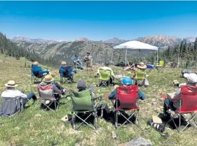  ?? Provided by Crested Butte Music Festival ?? Crested Butte Music Festival patrons enjoy open- air music in a remote location. This year’s event is holding live, public concerts through the first week of October.