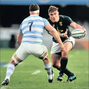  ?? PICTURE: BACKPAGEPI­X ?? CRUNCH TIME: Springbok hooker Malcolm Marx is challenged by Marcos Kremer of Argentina in Durban last Saturday.