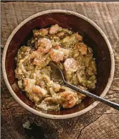  ?? CONTRIBUTE­D BY DENNY CULBERT ?? Smothered Eggplant and Shrimp, excerpted from “Mosquito Supper Club” by Melissa Martin (Artisan Books, $35), deliciousl­y melds two Cajun staples into one rustic, satisfying supper.