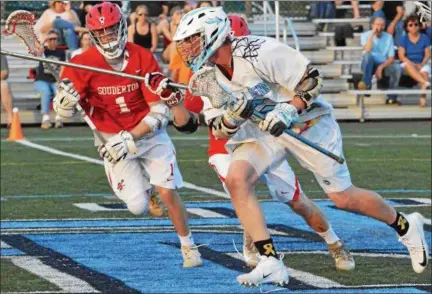  ?? DEBBY HIGH FOR DIGITAL FIRST MEDIA ?? North Penn’s Matthew Dickson charged towards the net during the 1st quarter of Thursday night’s game against Souderton.