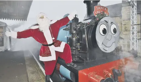  ??  ?? Santa greets visitors to Nene Valley Railway