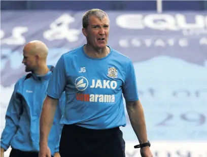  ??  ?? ●●Jim Gannon during Saturday’s game against Hereford