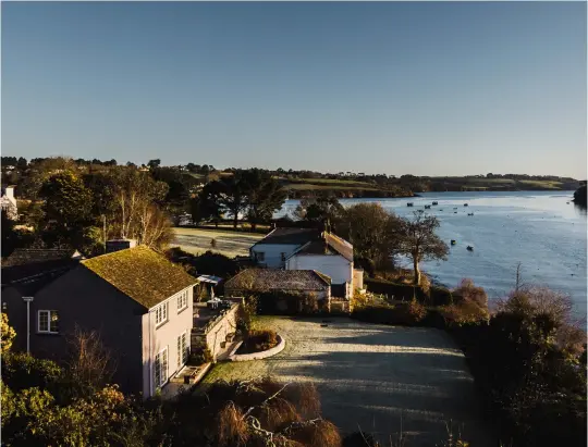  ?? ?? Quay House in Cornwall sits on a prime location on a private peninsula overlookin­g the beautiful and unspoilt Helford River. £1.35m