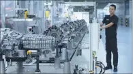  ?? PROVIDED TO CHINA DAILY ?? An engineer works at Audi’s DL382 transmissi­on assembly line. The company has high hopes for the localizati­on of its latest gearbox as it bids to respond rapidly to Chinese customers’ demands.