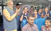  ?? PTI FILE ?? PM Narendra Modi interactin­g with children on board the RoRo ferry in Bhavnagar, Gujarat earlier this month.