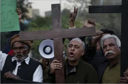  ?? K.M. CHAUDARY, THE ASSOCIATED PRESS ?? Pakistani Christians chant slogans during a demonstrat­ion in Lahore to condemn the suicide attack on a church in Quetta, Pakistan, on Sunday.