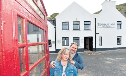  ?? Photograph by Kami Thomson ?? LOCAL HEROES: New owners of the famous Pennan Inn, Roland and Monika Focht.