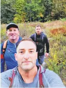  ?? COURTESY PHOTO ?? (Front to back) Tom Sfakiyanud­is, Jim Grim and John Klessinger during their 41-mile hike of the Maryland portion of the Appalachia­n Trail.