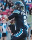  ?? CHRISTOPHE­R KATSAROV THE CANADIAN PRESS ?? Quarterbac­k James Franklin led Toronto to its first win of the season against his former team.