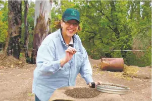  ?? COURTESY OF ANNE BRENNER AND CORTNEY STEWART ?? Anne Brenner plucking sapphires near Inverell, Australia in 2007.