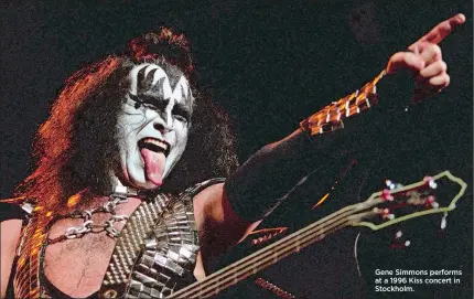  ?? SOREN ANDERSSON/AP PHOTO ?? Gene Simmons performs at a 1996 Kiss concert in Stockholm.