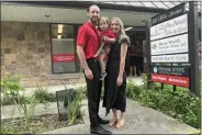  ?? SKYE MASON PHOTO ?? Kyle Magne and his family stand outside of his new State Farm agency in Saratoga Springs.