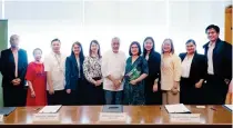  ?? CONTRIBUTE­D PHOTO ?? Philippine Veterans Bank President and Acting CEO Renato Claravall and Palawan Group of Companies Cash Management Solutions Director Lisa Lou Castro-Sabado (6th and 7th from left, respective­ly) lead their respective organizati­ons during the signing of the memorandum of agreement where PVB depositors can withdraw cash at over 300 company-owned Palawan Pawnshop-Palawan Express Pera Padala branches.