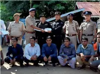  ?? Reuters file ?? The first seven Rohingya men were deported as Indian and Myanmar security officials exchange documents at Moreh in Manipur last year. —