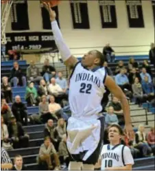  ??  ?? Brandon Knotts takes the ball to the basket for the Indians.