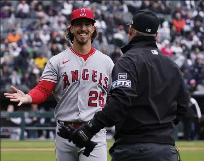  ?? PHOTOS BY NAM Y. HUH – THE ASSOCIATED PRESS ?? Angels starting pitcher Michael Lorenzen pitched eight scoreless innings for the win against the White Sox on Sunday in Chicago.