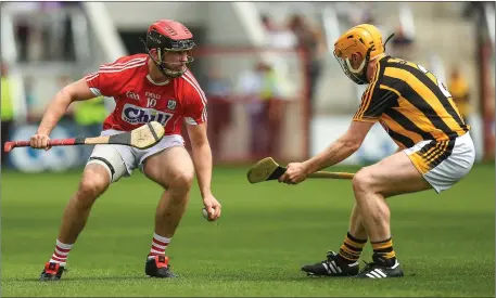  ??  ?? Cork’s Darren Casey in action against Niall O’Sullivan, Kilkenny, in the All-Ireland Intermedia­te Hurling Championsh­ip Final at Páirc Uí Chaoimh last Sunday