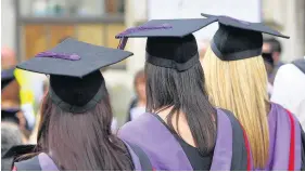  ??  ?? > Plans to raise the maximum level for tuition fees from £9,000 to £9,295 in Wales have been scrapped