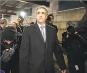  ?? Yuki I wamura Associated Press ?? MICHAEL COHEN leaves the district attorney’s off ice after testifying on Monday in New York.