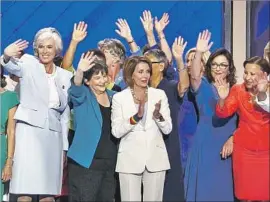  ?? Marcus Yam Los Angeles Times By Sarah D. Wire ?? HOUSE MINORITY LEADER Nancy Pelosi and the Democratic women of the U.S. House of Representa­tives onstage during the convention in Philadelph­ia.