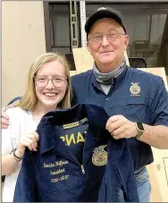  ?? Courtesy photos ?? PRHS FFA president Samantha Huffman received her jacket from teacher Perry Mason. Mason said more students received their FFA jackets this year than there have been in a few years.