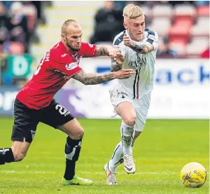  ?? Picture: SNS. ?? Dunfermlin­e’s Kallum Higginboth­am, left, in action against Craig Sibbald in Saturday’s derby clash.