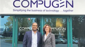  ??  ?? Terry Mirza, vice-president sales Western Canada and U.S., and Darlene Nyegaard, regional leader, Alberta brand and partnershi­ps, at Compugen’s new offices in Sunridge Business Park at 29th Street N.E. in Calgary.