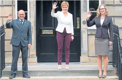  ?? ?? ALLIANCE: First Minister Nicola Sturgeon, centre, with Greens Patrick Harvie and Lorna Slater.