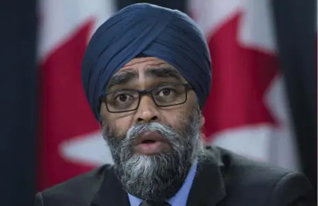  ?? SEAN KILPATRICK/THE CANADIAN PRESS FILE PHOTO ?? Defence Minister Harjit Sajjan framed the new powers as defensive measures, needed to combat misinforma­tion about Canadian soldiers in the field.