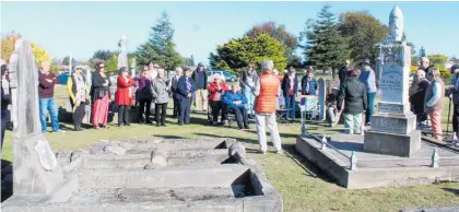  ??  ?? Friends of the Dannevirke Settler Cemetery president Sharyn Burling welcomes the 50 visitors to the latest cemetery walk on Sunday, May 2.